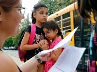 Students arrive for the first day of school at the Hayden McFadden Elementary School in New Bedford.  PETER PEREIRA/THE STANDARD-TIMES/SCMG